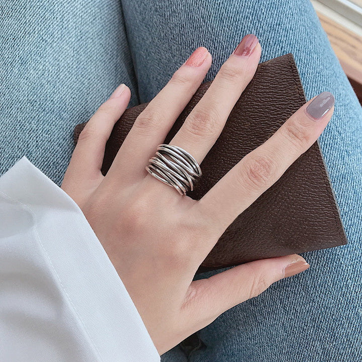 Anillo ajustable de plata con capas