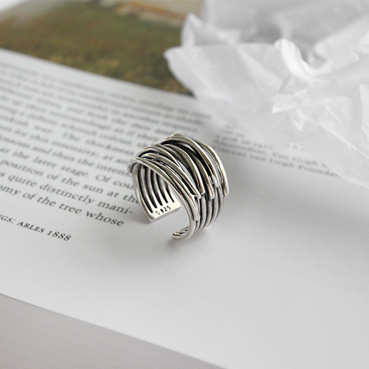 Anillo ajustable de plata con capas